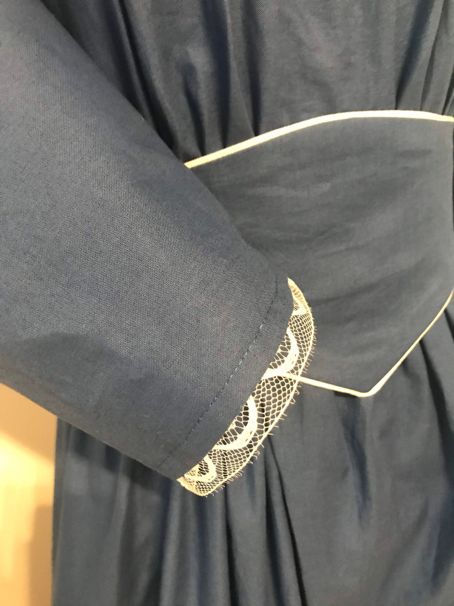enola holmes blue dress All Of The Hidden Costume Details To Look Out For While Watching 'Enola Holmes' On Netflix