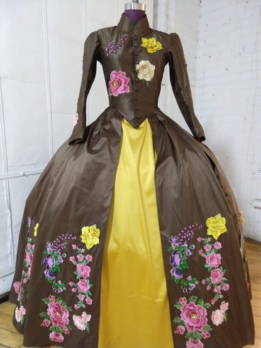 Brown silk dress with heavy floral decoration
