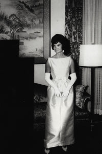 jackie o short wedding dress I read before that Jackie didn't really care for her wedding dress. She felt it was too fussy. I can imagine her liking something much more sleek. Joseph Kennedy insisted on this